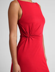 red midi dress with a bateau neck and side twist.