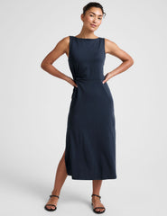 blue midi dress with a bateau neck and side twist.
