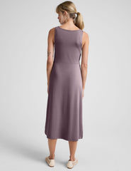 brown midi length dress with a side twist detail and side slit.