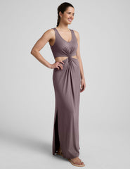 brown v-neck tank maxi length dress with cutouts at the waist.