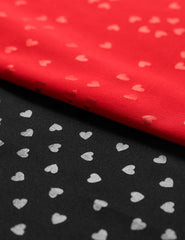 black and red heart printed fabric.