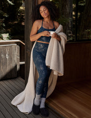 blue high-waisted midi leggings with a star foil print.