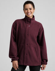 red fleece button up jacket with a full front zip and snap closures and pockets.