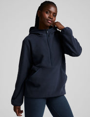 blue fleece quarter zip jacket with a kangaroo pocket.
