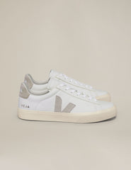 white and tan Veja sneakers.