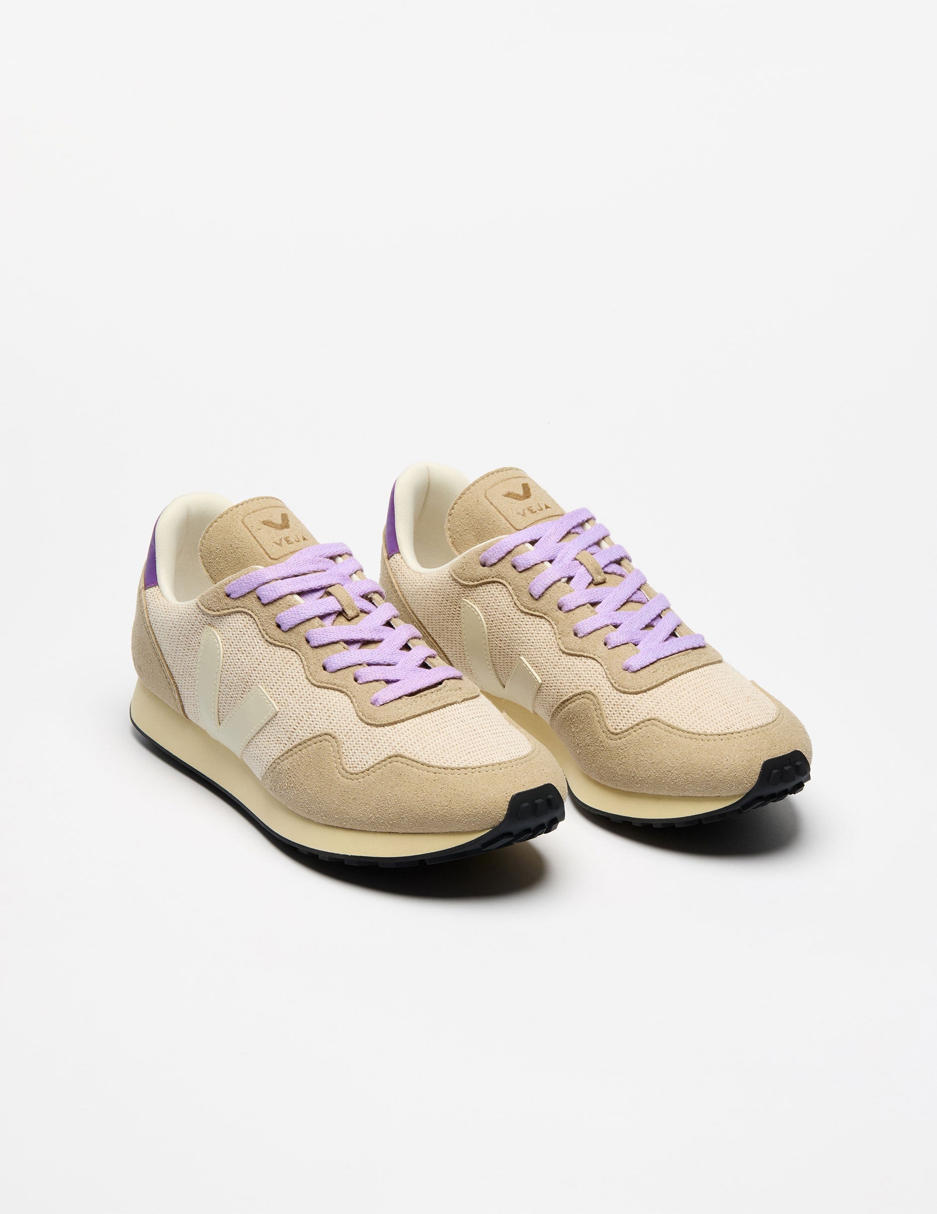 multi-colored VEJA sneakers.