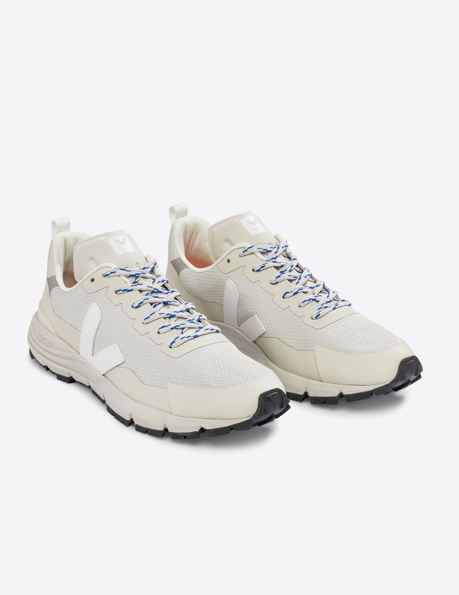 white VEJA sneakers for outdoor activities.