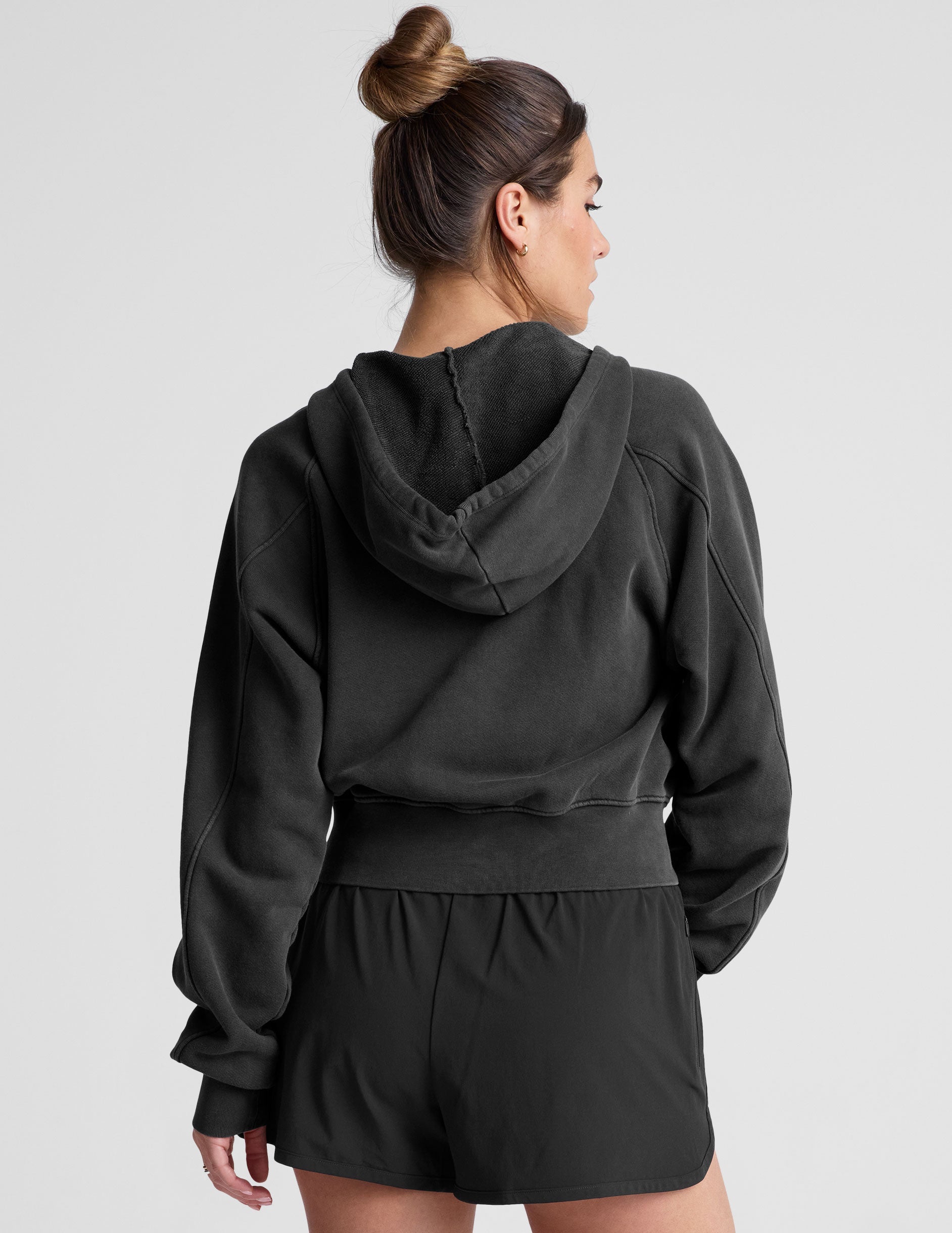 black zip-up hoodie jacket with pockets.