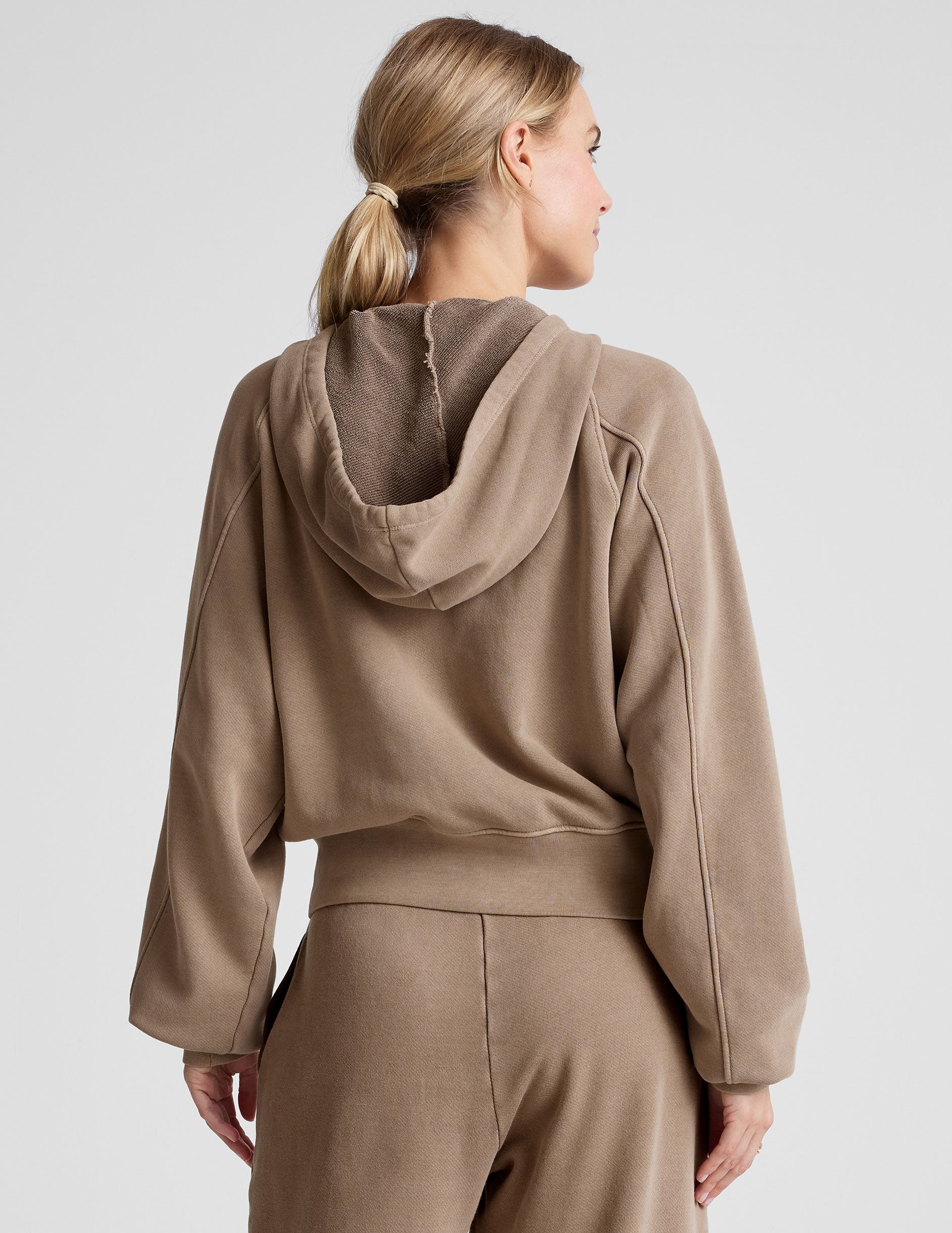 brown zip-up hoodie jacket with pockets.