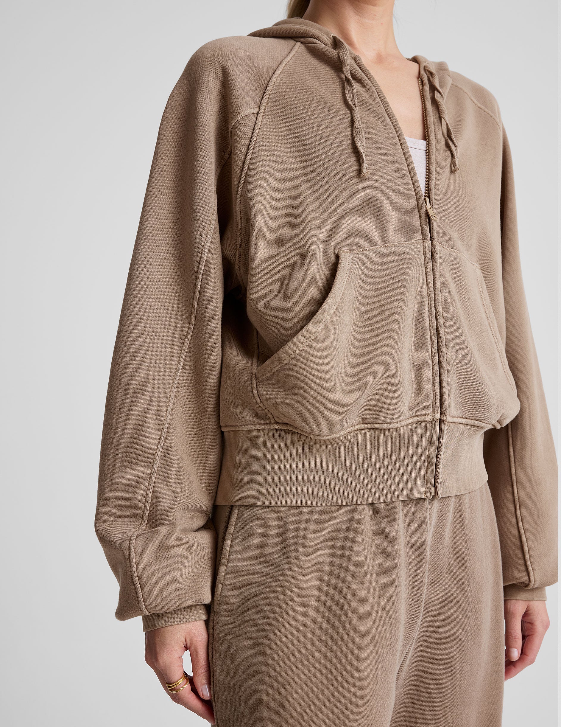 brown zip-up hoodie jacket with pockets.