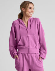 pink zip-up jacket with pockets and a hoodie.