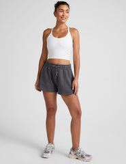 black shorts with patch pockets and a drawstring at waistband.