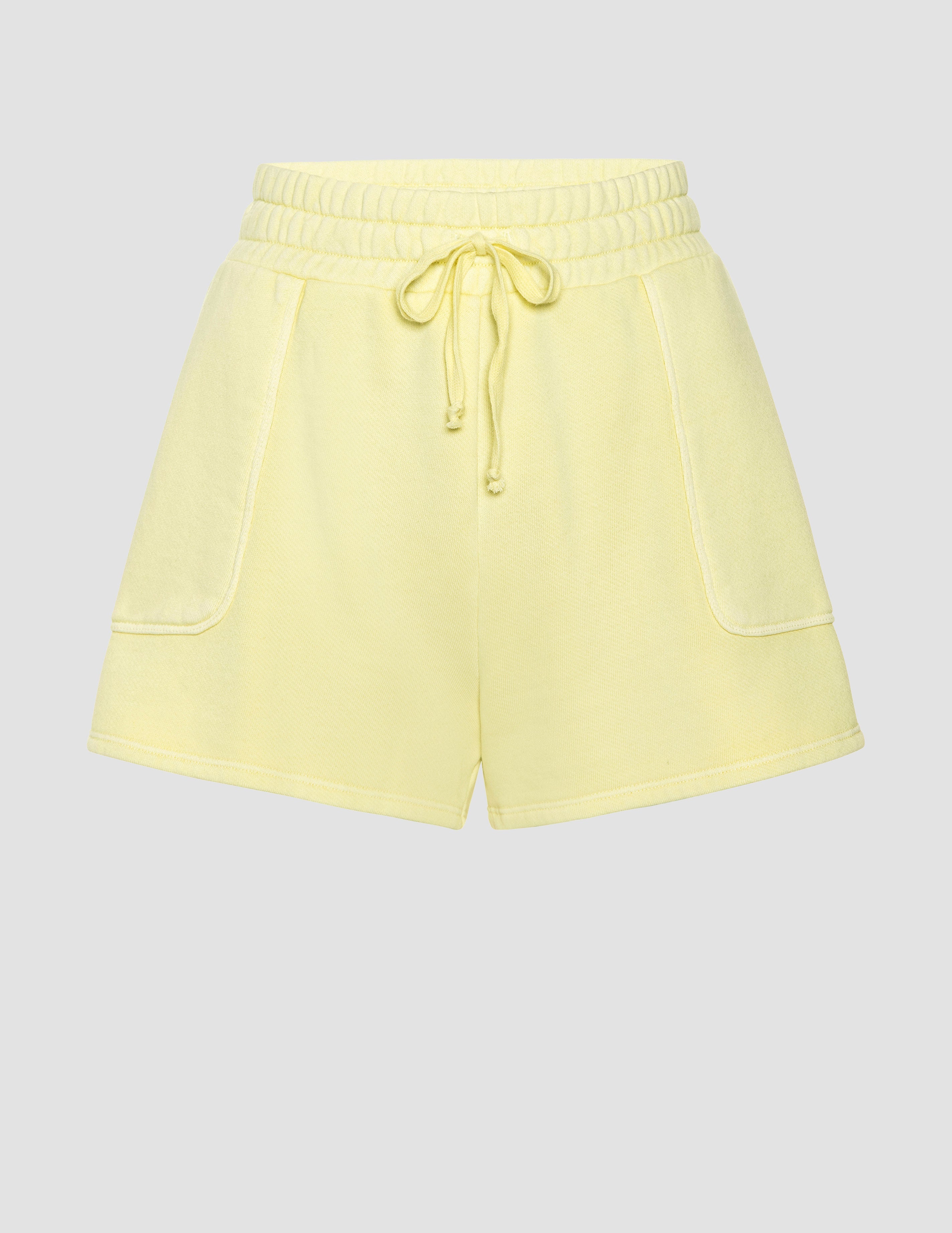 yellow terry shorts with pockets and a drawcord at waist.