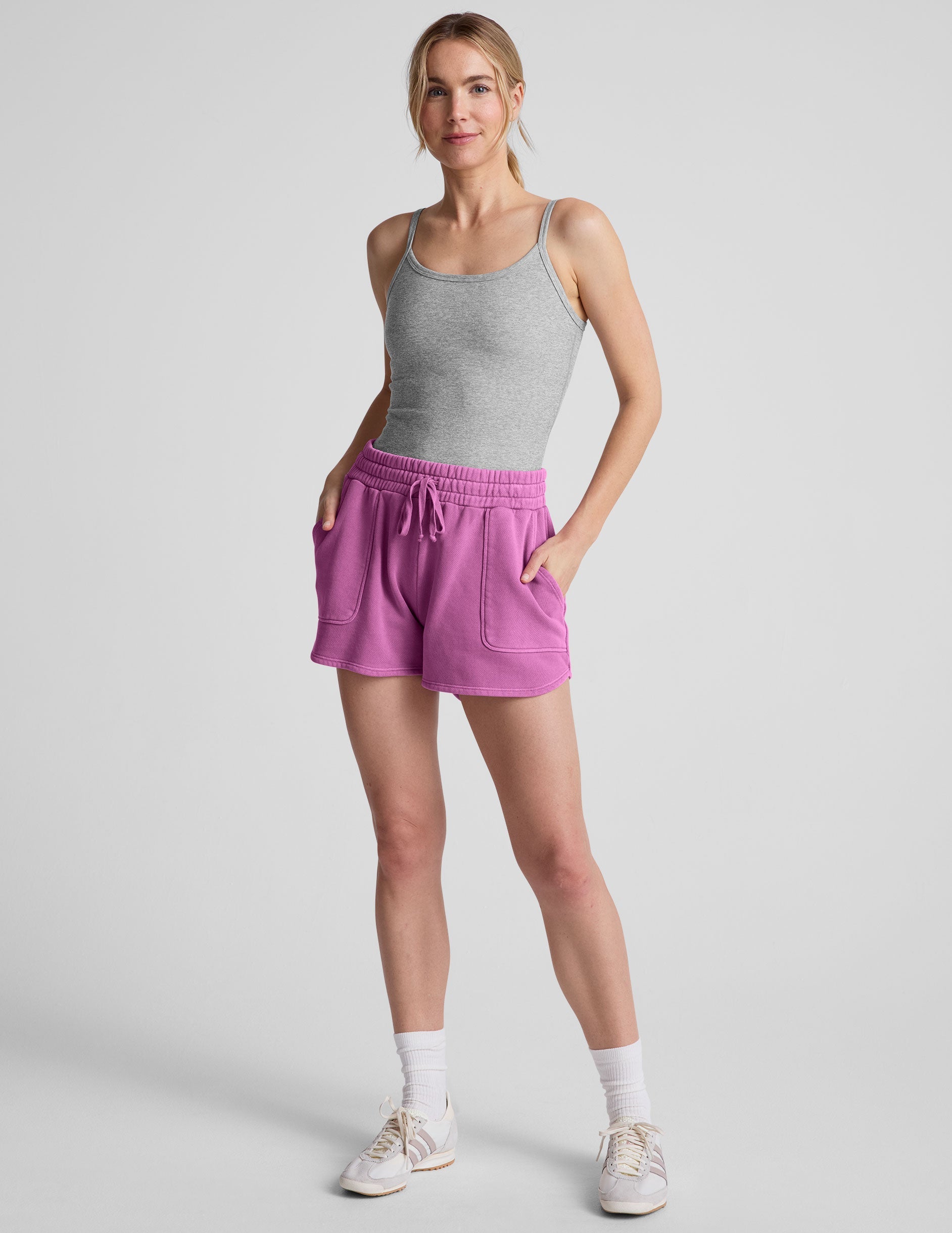 pink shorts with patch pockets and a drawstring at waistband.