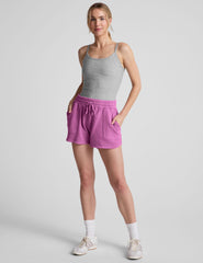pink shorts with patch pockets and a drawstring at waistband.