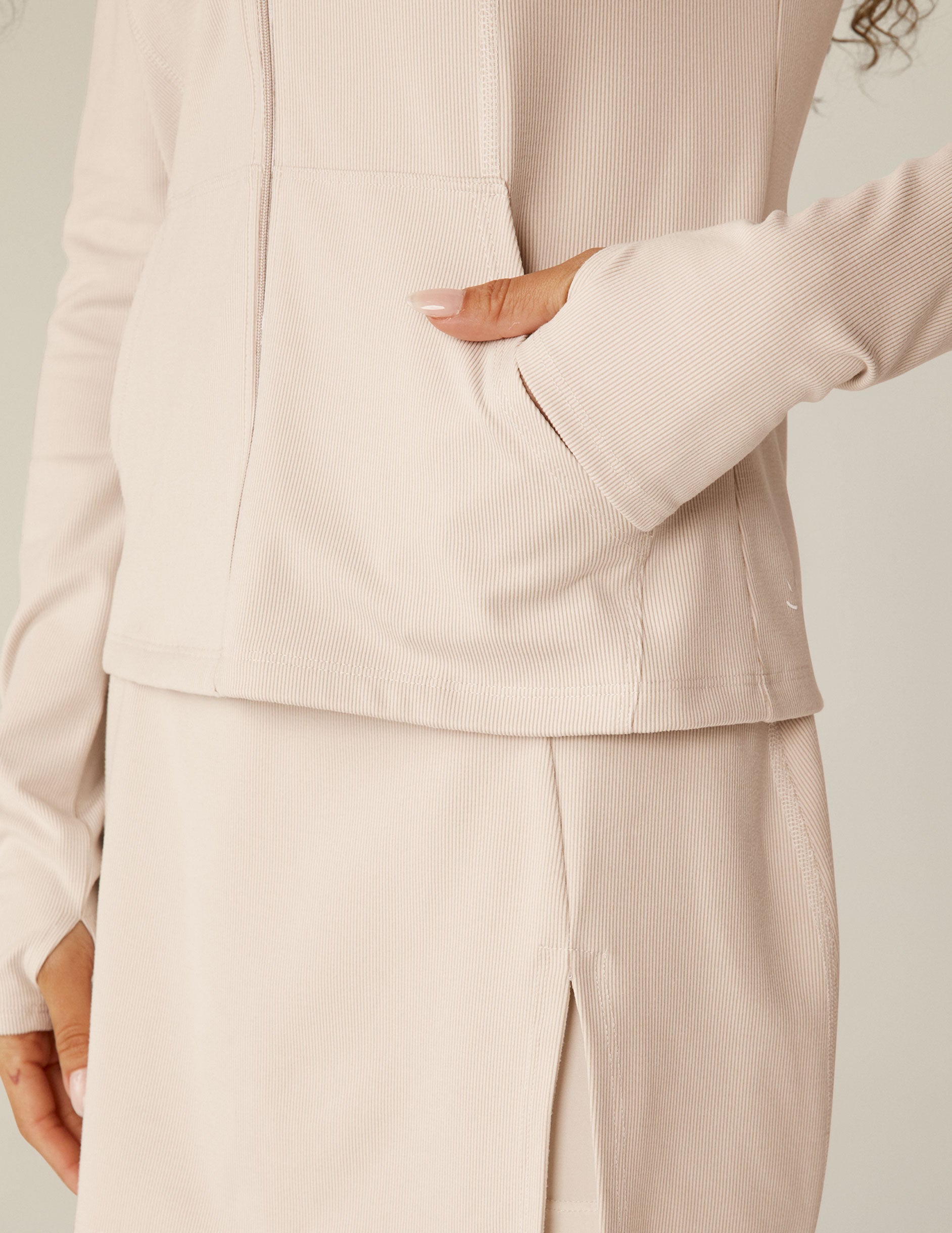 white heather rib zip-up hooded jacket with pockets.