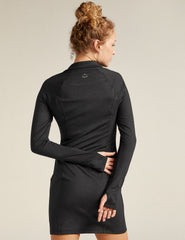 black midi dress with quarter-zup neckline.