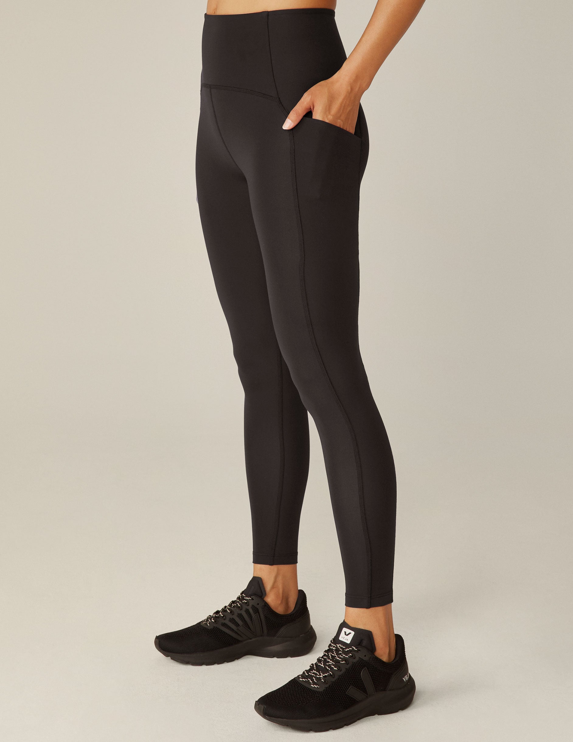 black powerbeyond midi leggings with pockets.