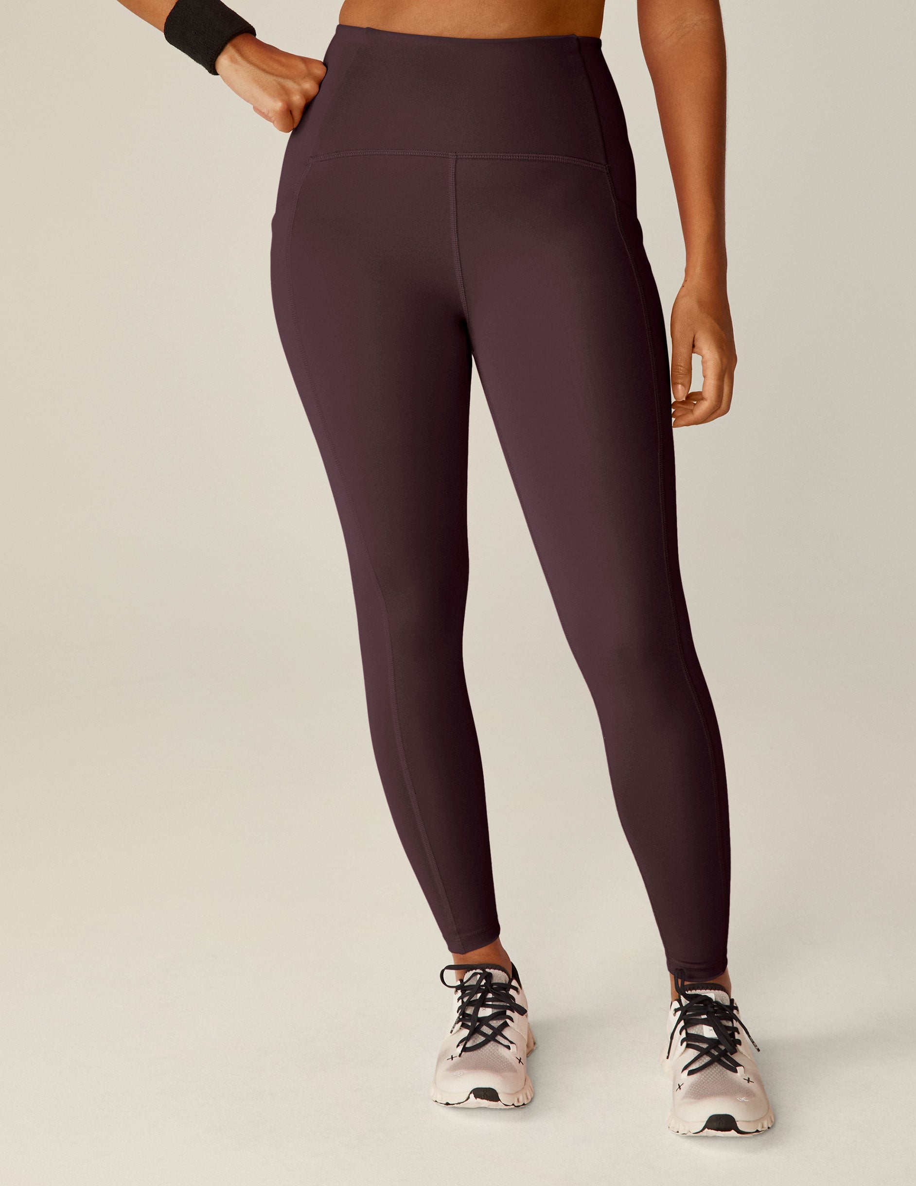purple midi length leggings with pockets.