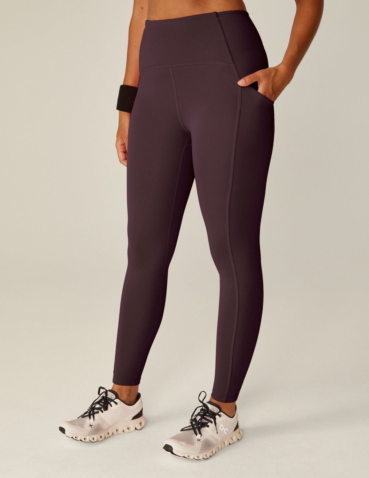 purple midi length leggings with pockets.