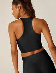black v-neck racerback cropped POWERBEYOND tank top.