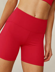 red POWERBEYOND™ biker shorts.