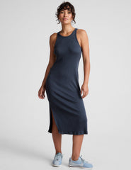 blue ribbed midi length dress with a high scoop neckline and side slit.