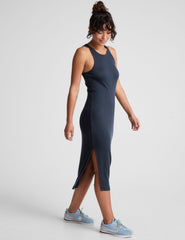 blue ribbed midi length dress with a high scoop neckline and side slit.