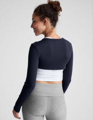 blue ribbed long sleeve shrug top.