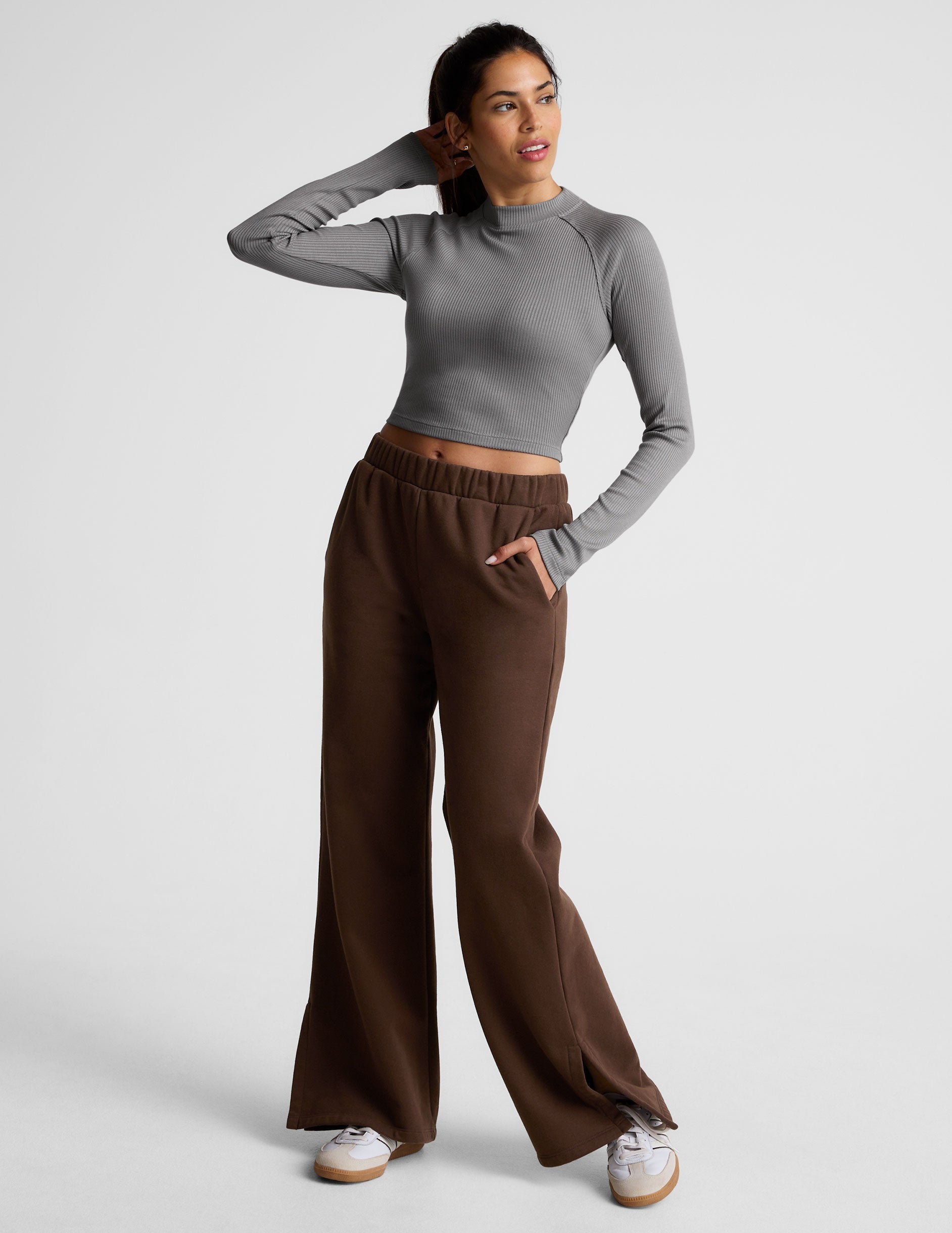 gray ribbed mock-neck cropped long sleeve top.