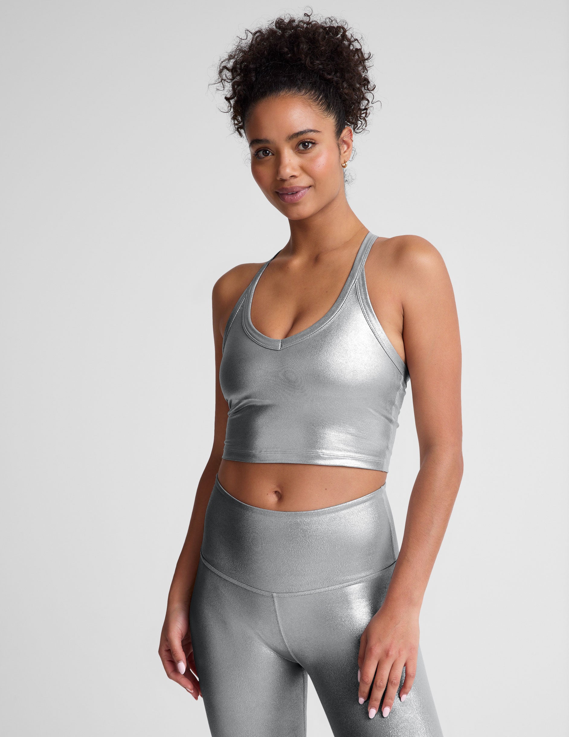 silver crop top.