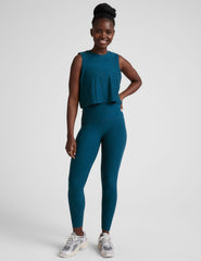 blue relaxed fit cropped tank top with a crew neckline.