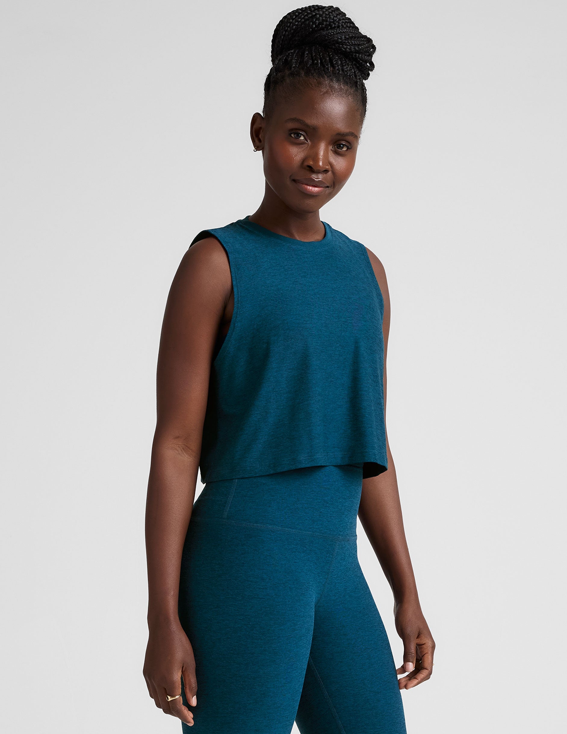 blue relaxed fit cropped tank top with a crew neckline.