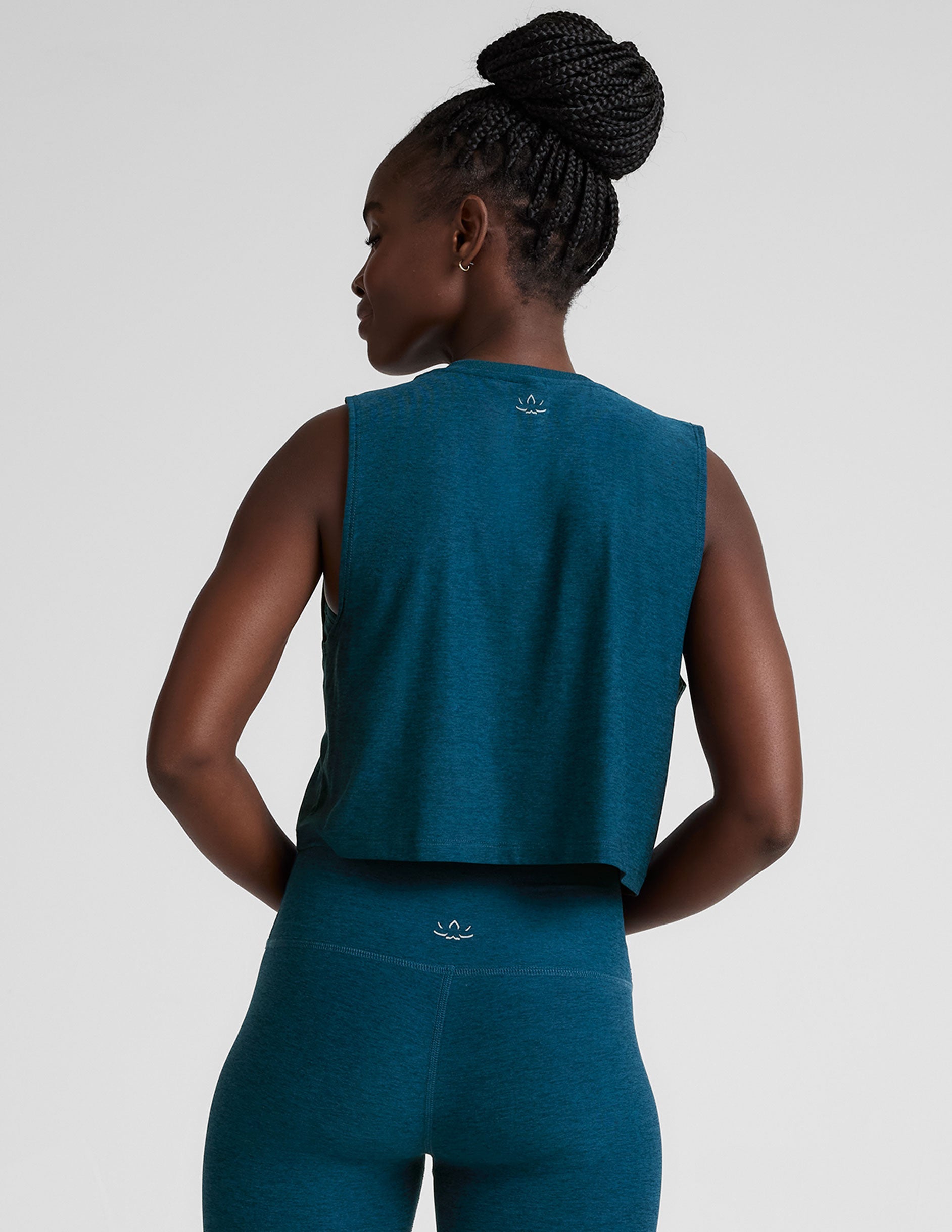 blue relaxed fit cropped tank top with a crew neckline.