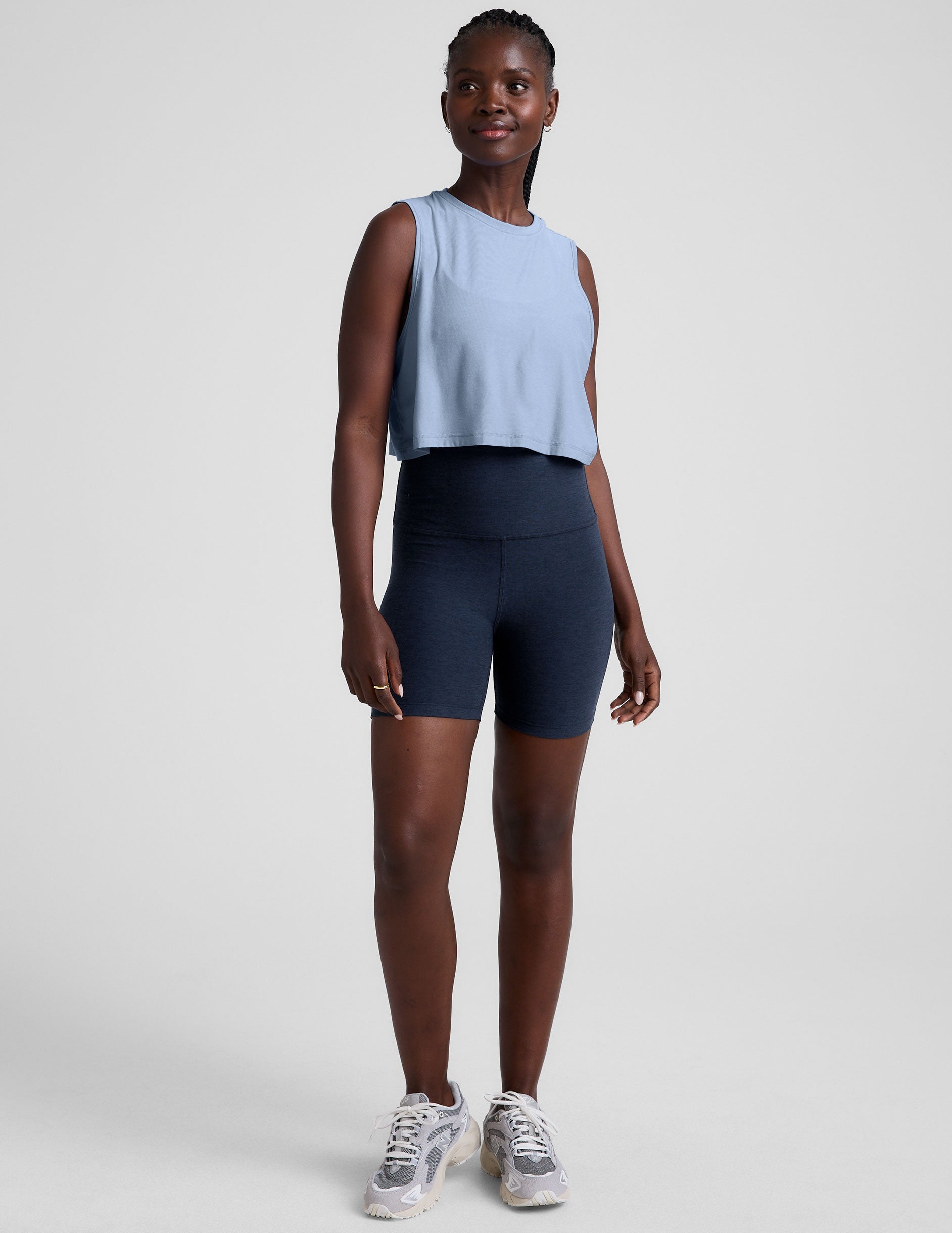 blue relaxed fit cropped tank top with a crew neckline.