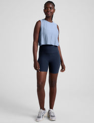 blue relaxed fit cropped tank top with a crew neckline.