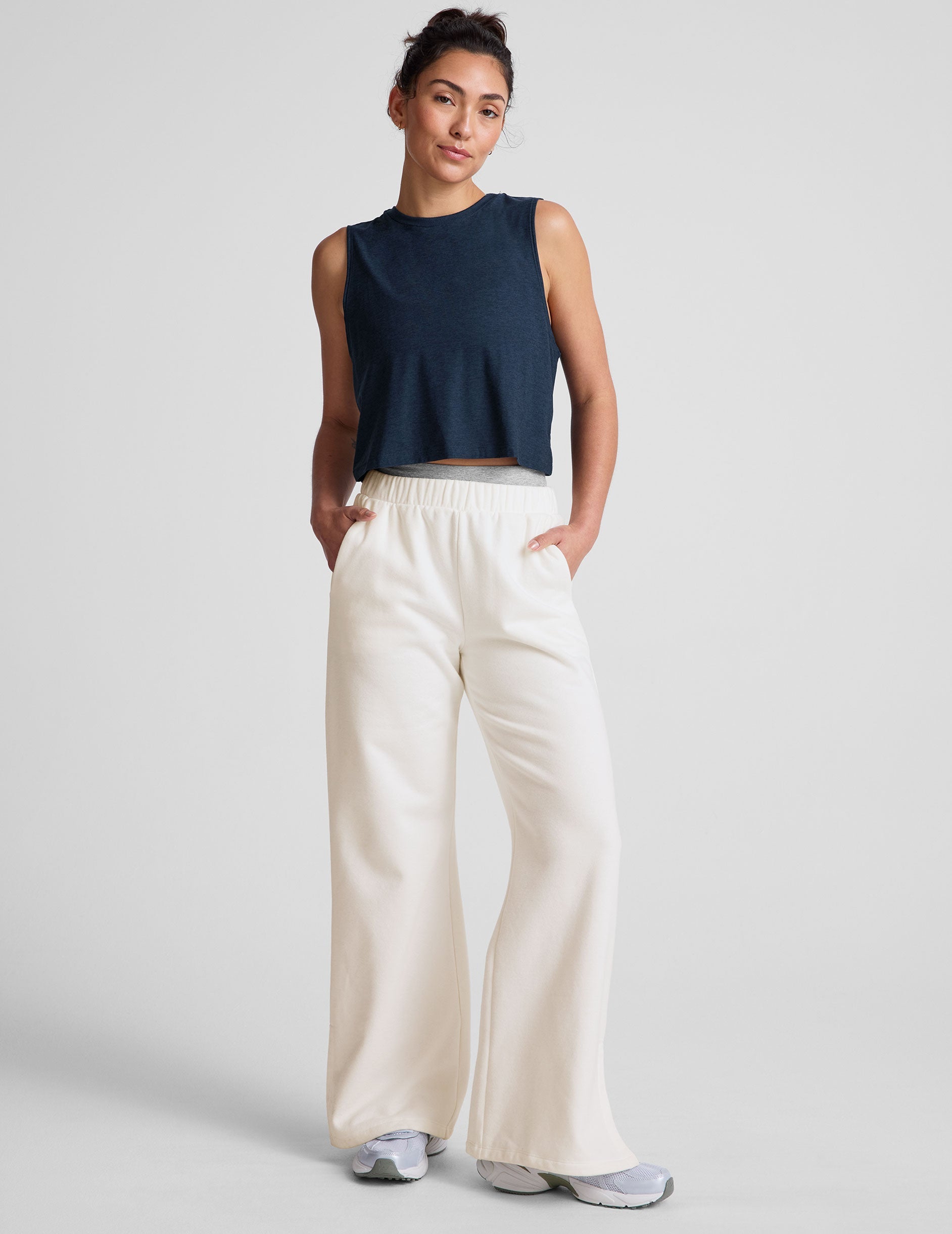 blue relaxed fit cropped tank with a scooped ribbed neckline and ribbed arm holes.
