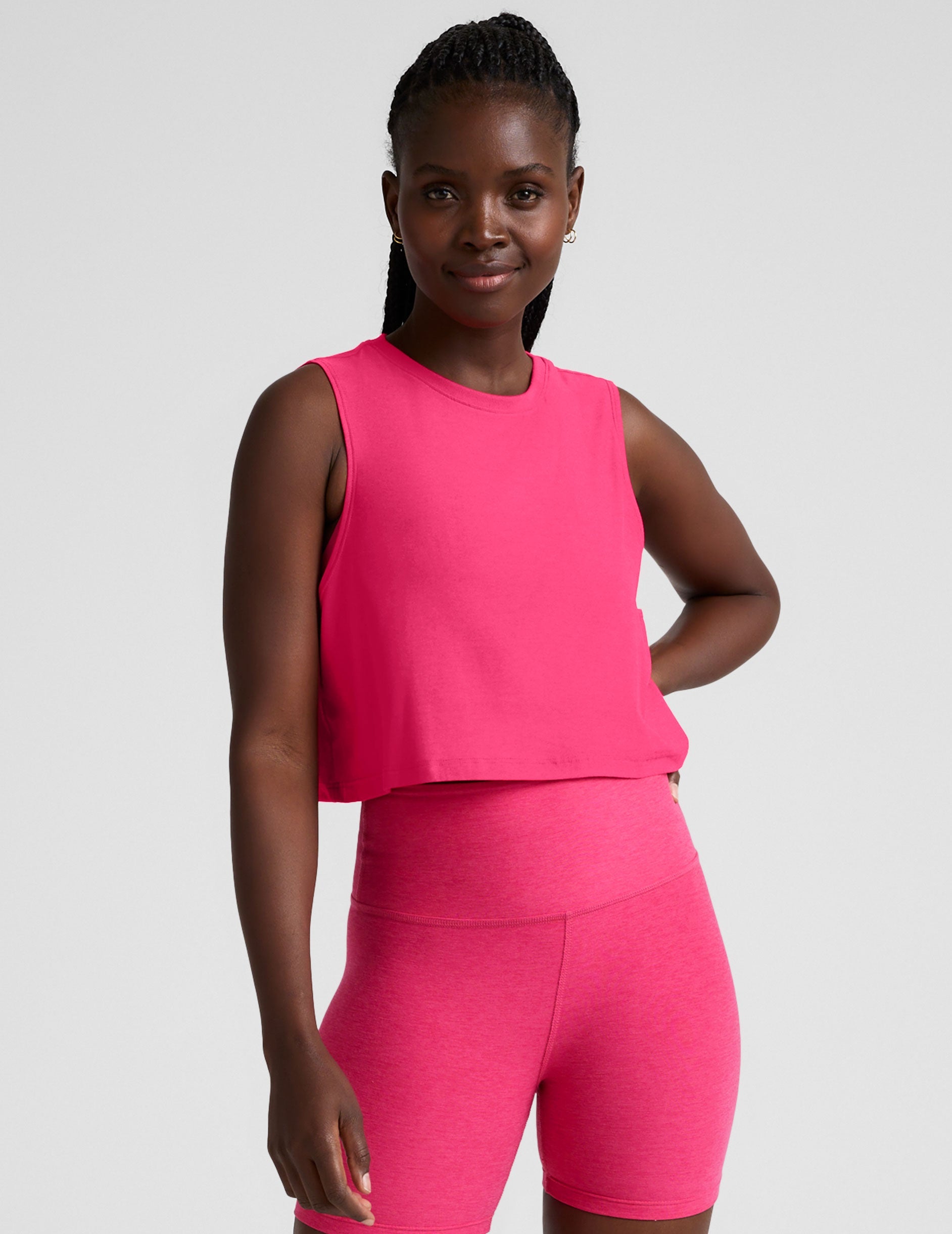 pink loose fitting cropped tank top.