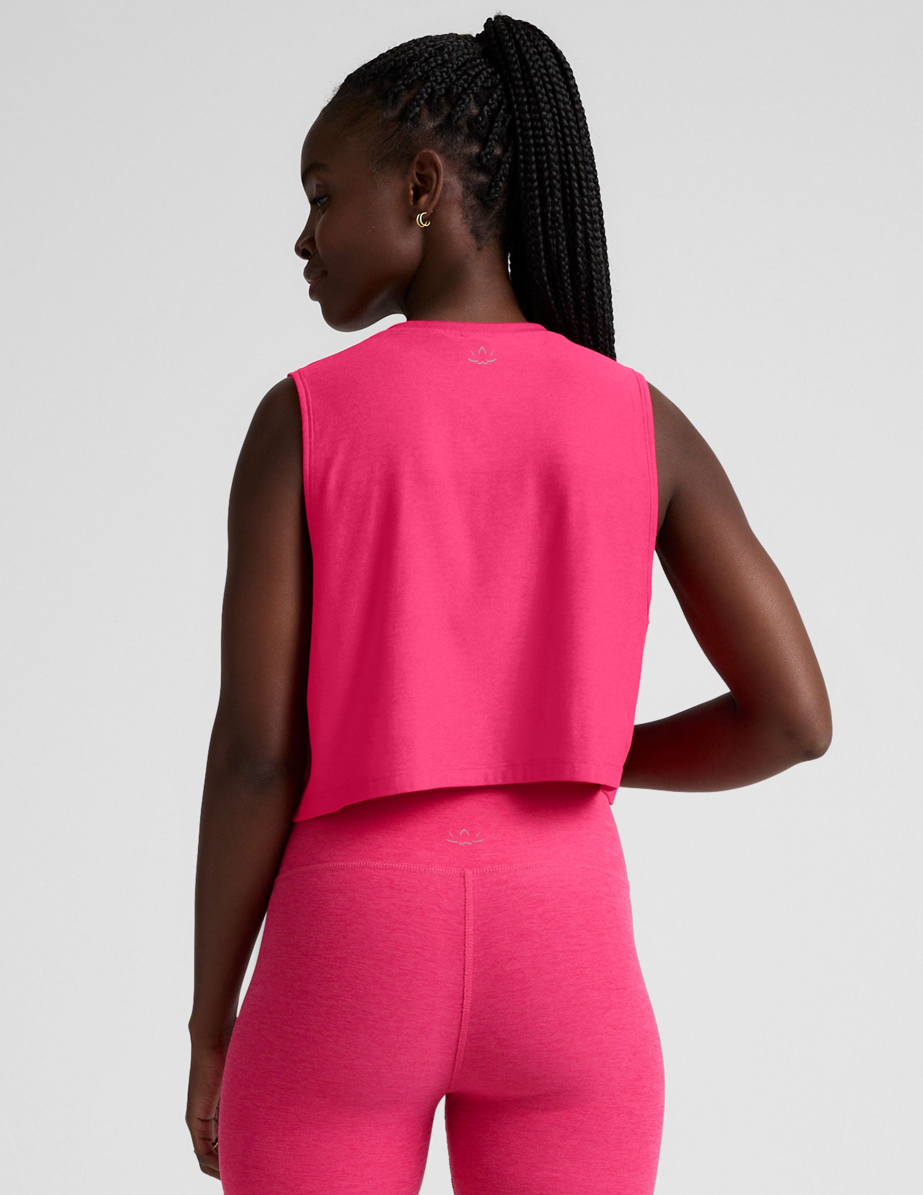 pink loose fitting cropped tank top.