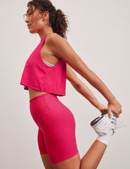 pink loose fitting cropped tank top.