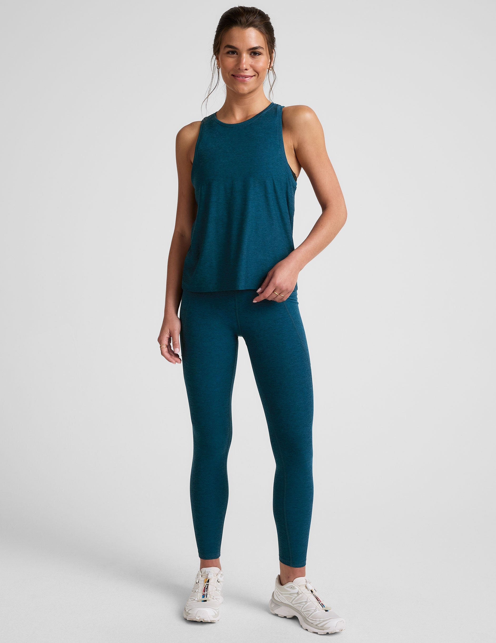 blue relaxed fit tank top with a high scoop neckline.