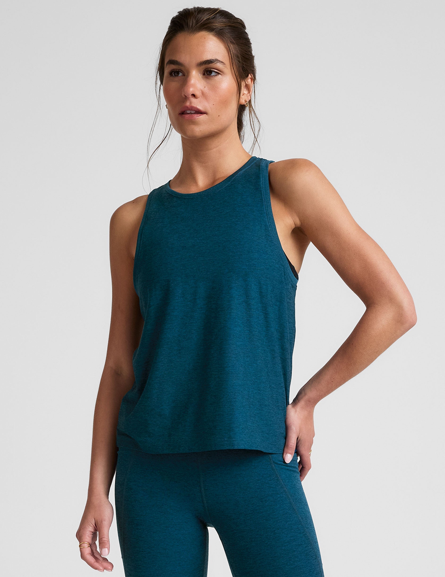 blue relaxed fit tank top with a high scoop neckline.