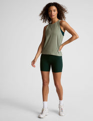 green relaxed fit tank with a hight front neckline.