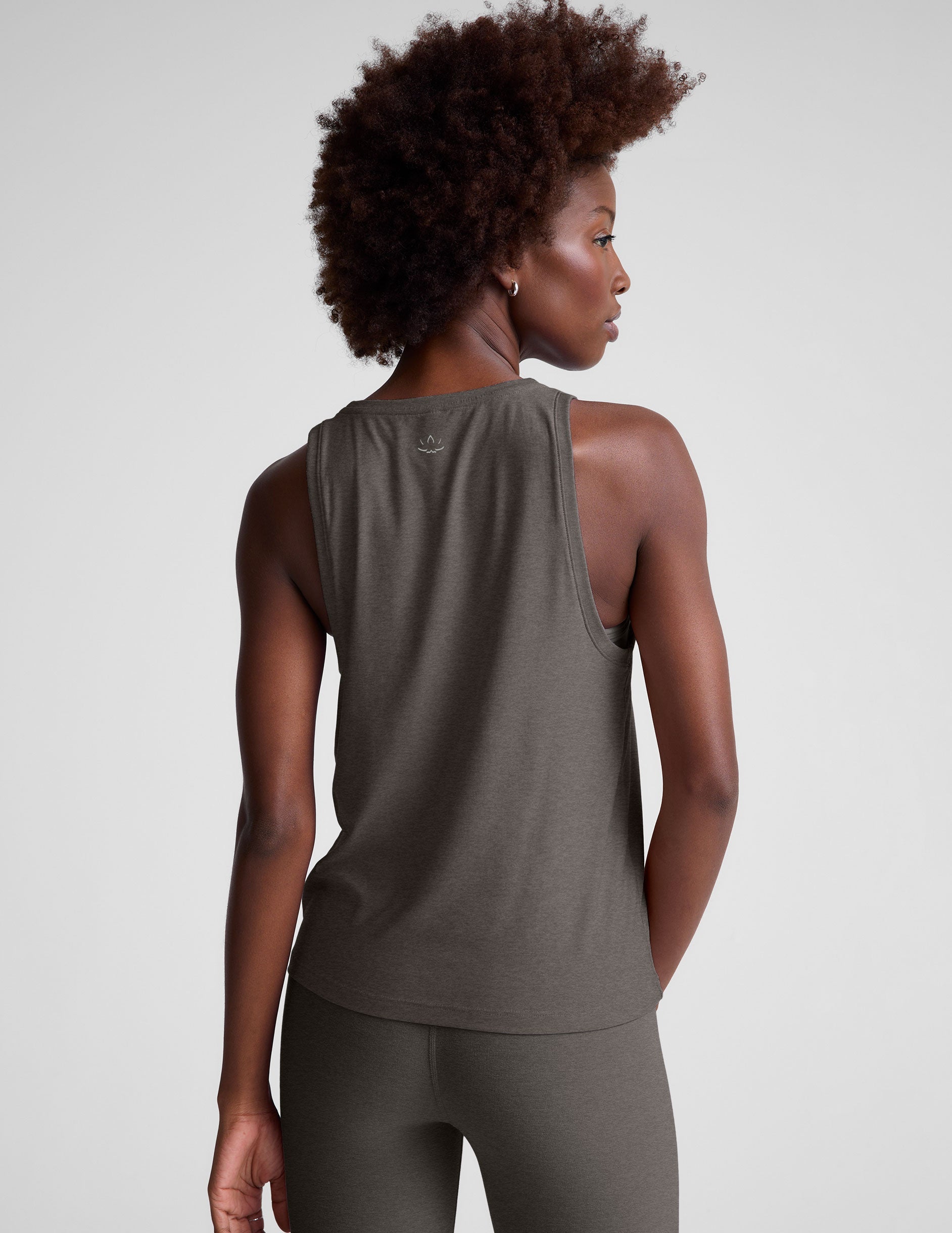 gray loose-fitting lightweight tank top with a high front neckline.