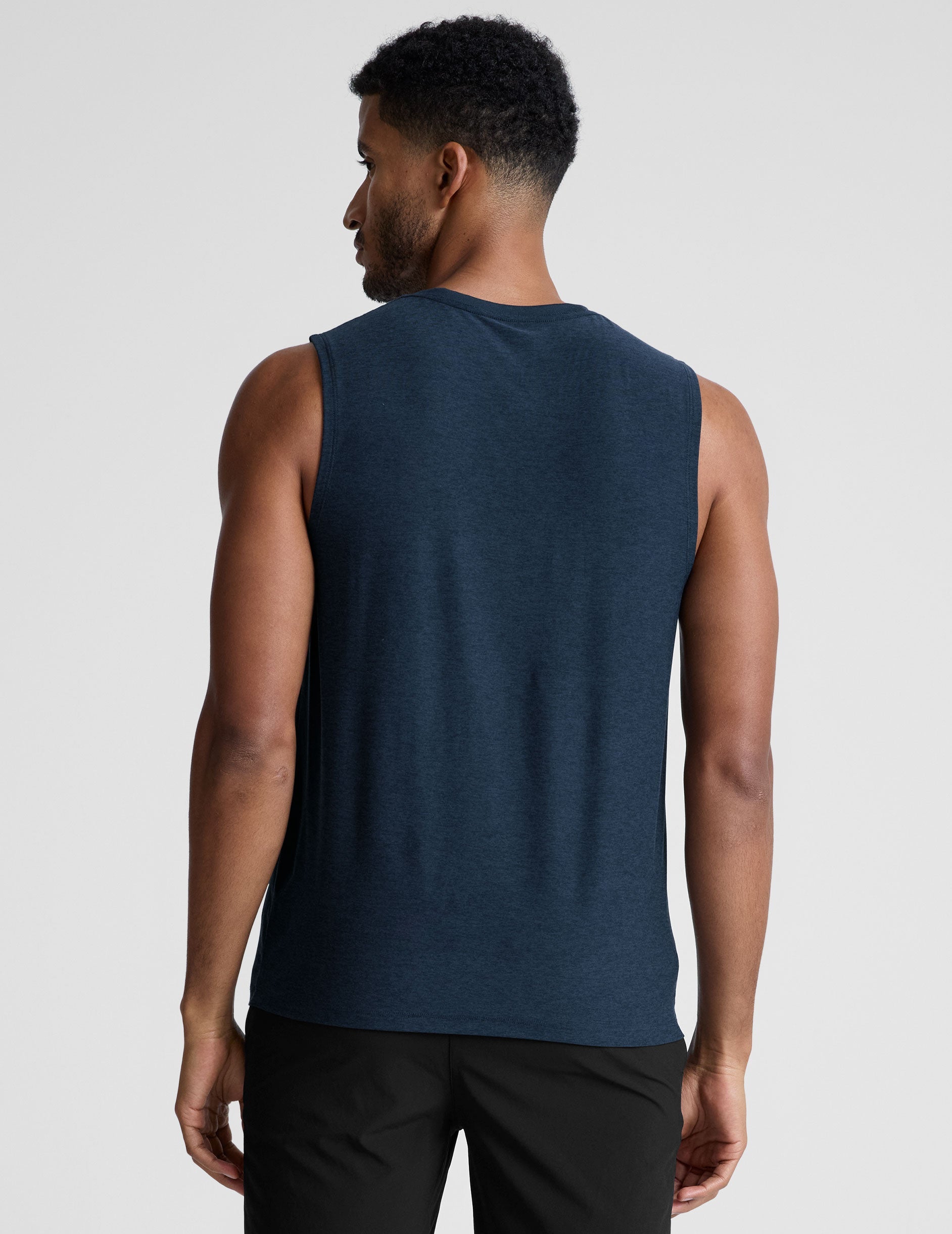 blue sleeveless mens muscle tank top with a ribbed collar.