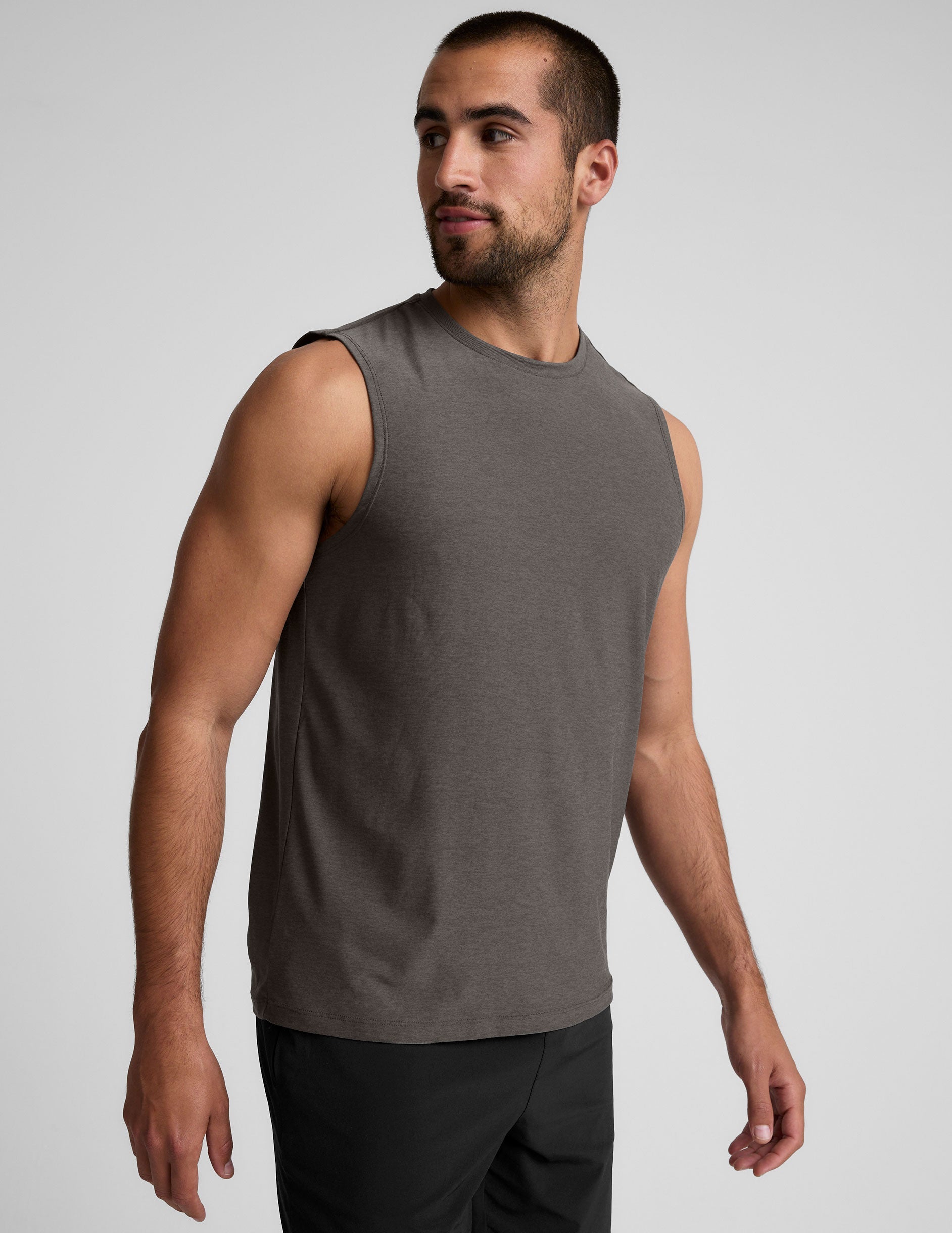 brown sleeveless mens muscle tank top with a ribbed collar.