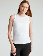 white tank with shirring details down the sides.