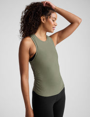 green scoop neck tank top with shirred detailing on the sides.