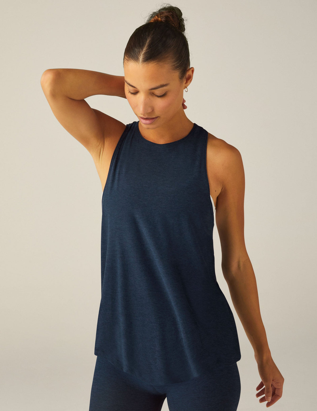 blue high scoop neck racerback tank top with a back keyhole with draping detail