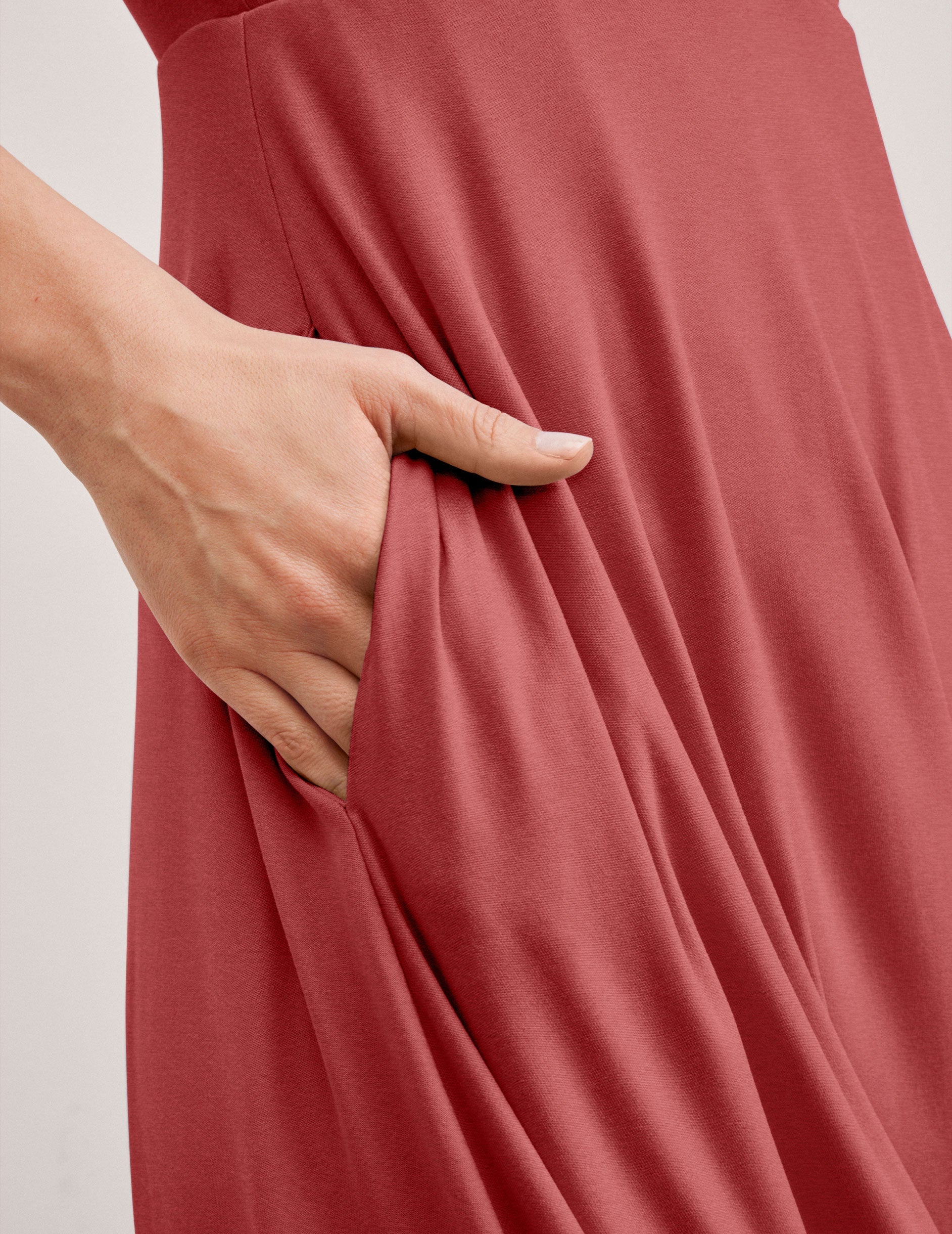 red square neck midi length dress with pockets.